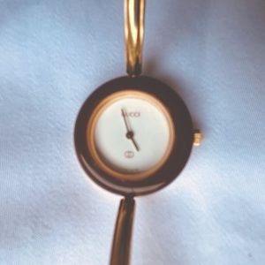Brown Gucci bezel